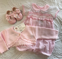 Baby girls pink slotted romper