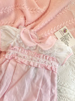 Baby girls pink slotted romper