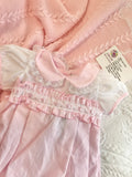 Baby girls pink slotted romper