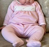 Baby girls pink smocked baby grow