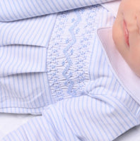 Baby boys magnolia Smocked romper blue and white .