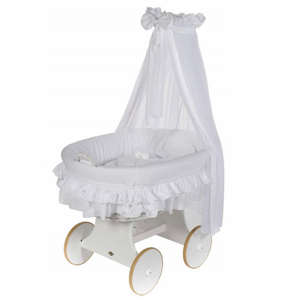 Lulu due . White basket. White snuggle pod bumper mattress and hood cot