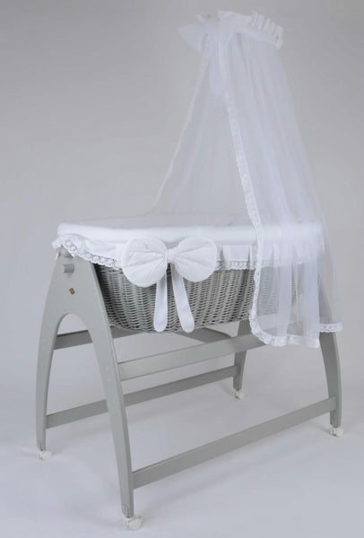 Miranda Quattro. Grey basket. White bedding. Cot .